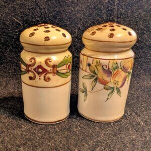 Porcelain salt and pepper shakers with hand-painted designs by Nippon